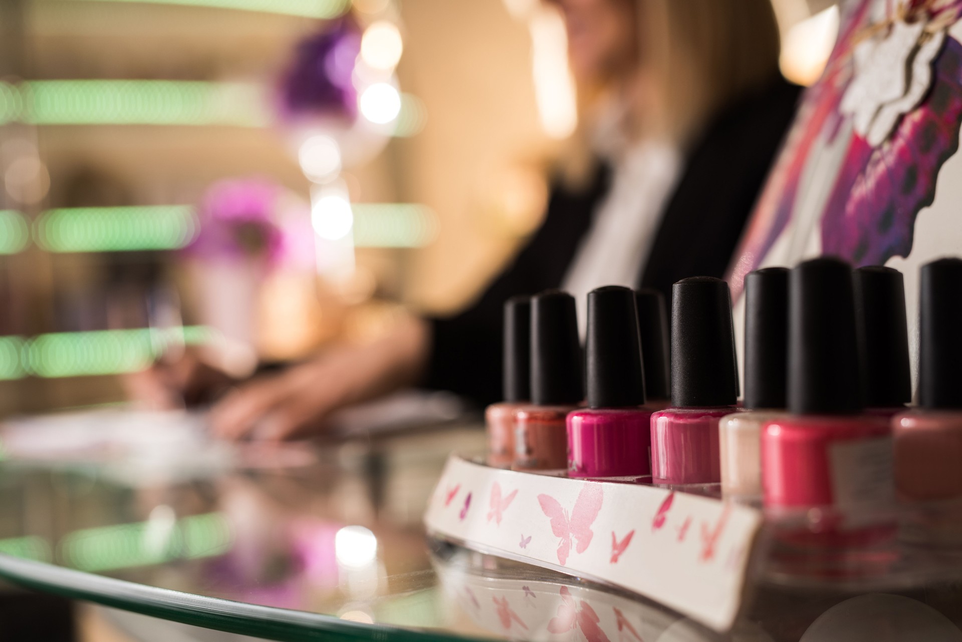 Close up of large group of multi-colored nail polish.